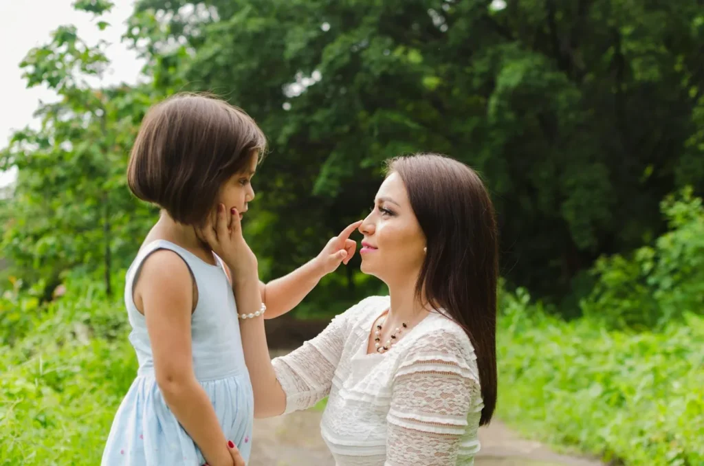 Woman talking to her daughter