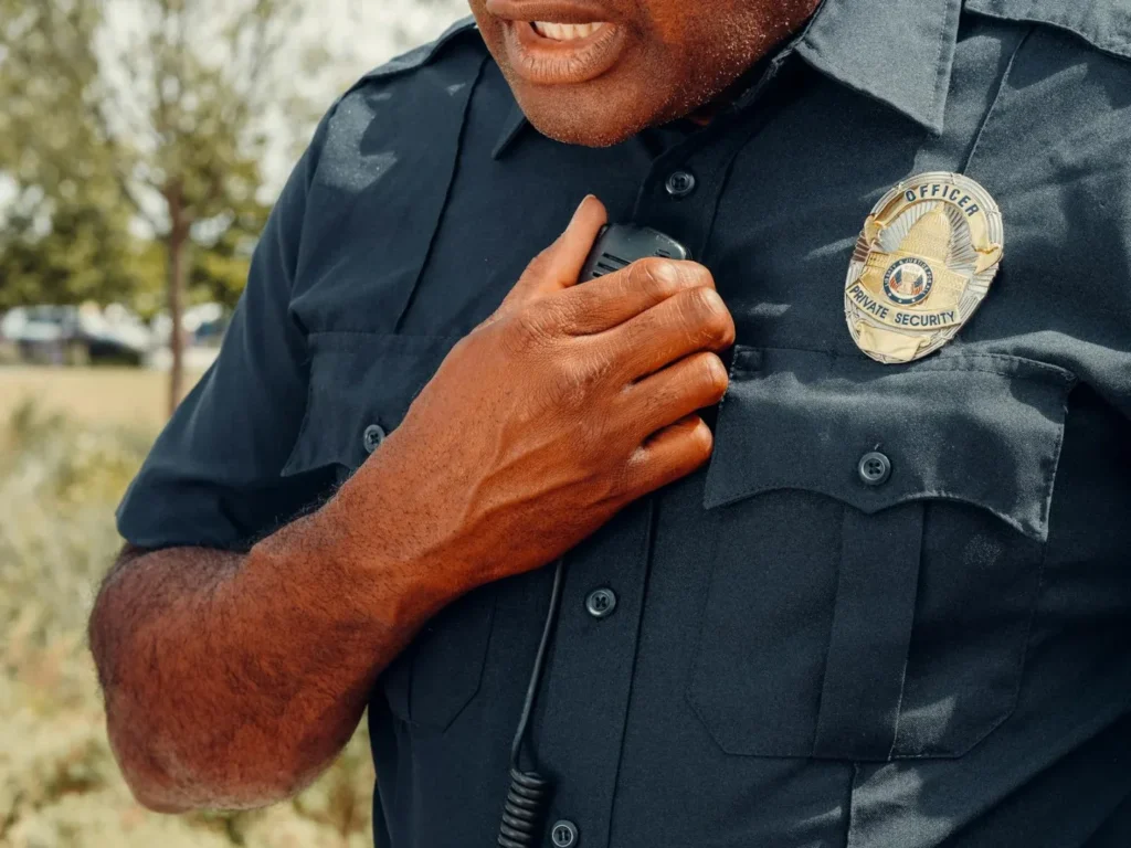 Police Officer Using a Communication Radio