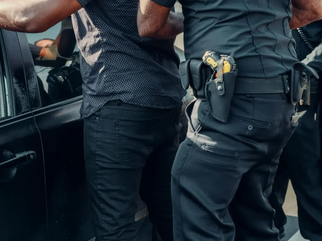 Police officer detaining a criminal