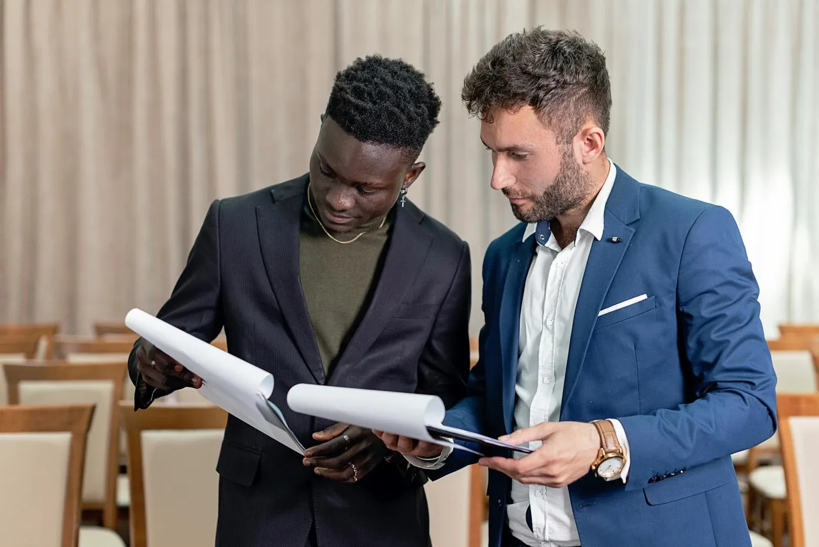 Men looking through legal documents