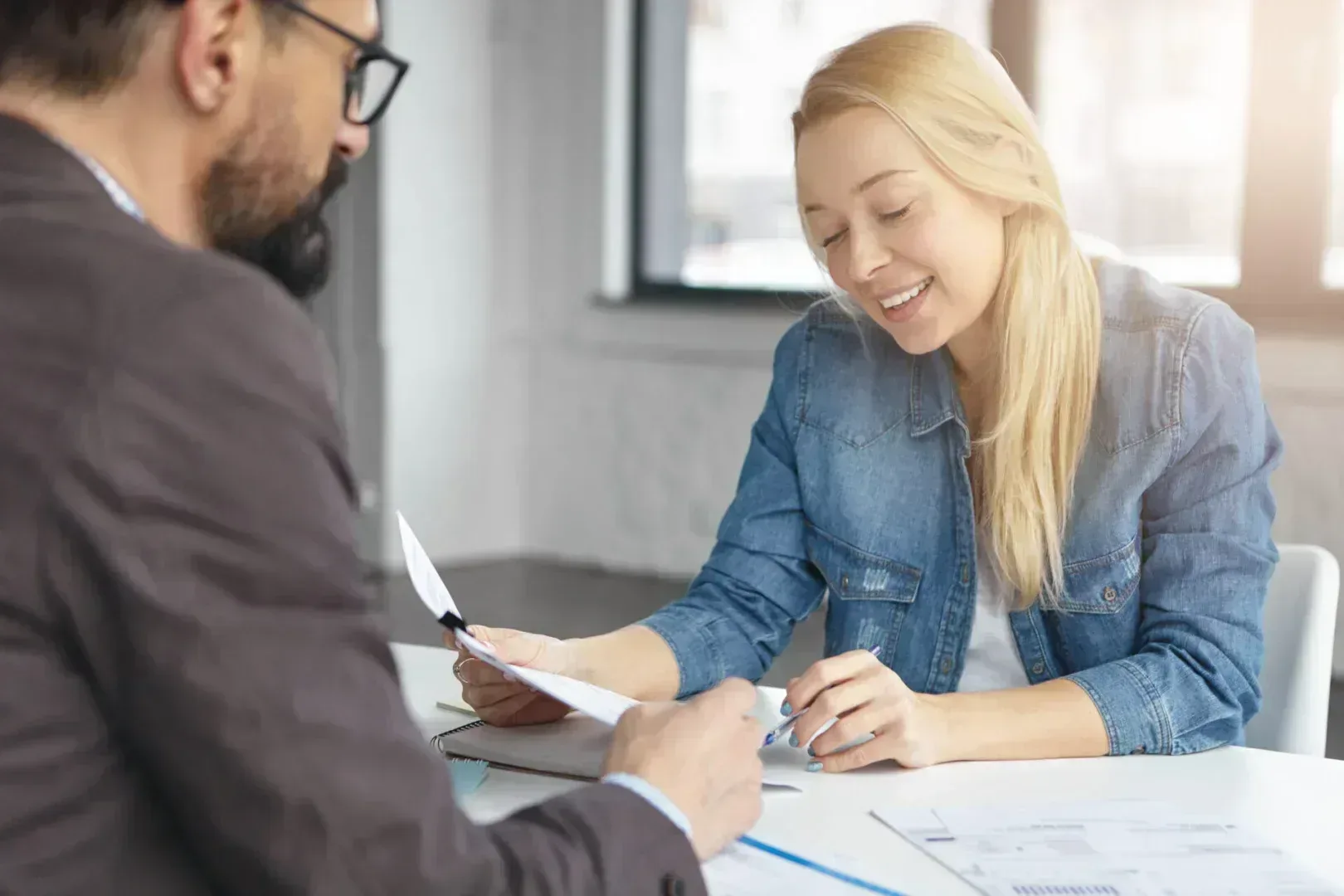 Woman having meeting with divorce lawyer