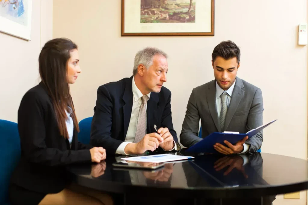 Couple having meeting with divorce lawyer