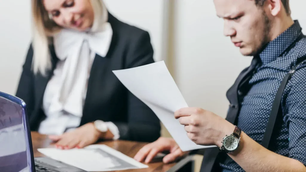 Man reading legal documents