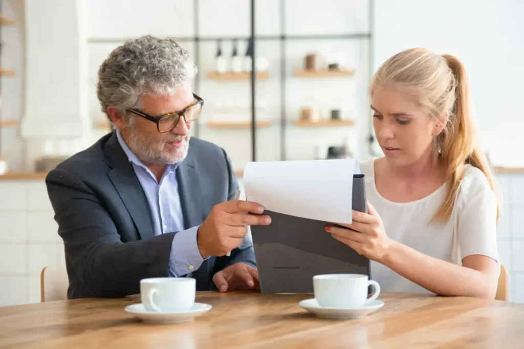 Lawyer showing divorce papers to the client