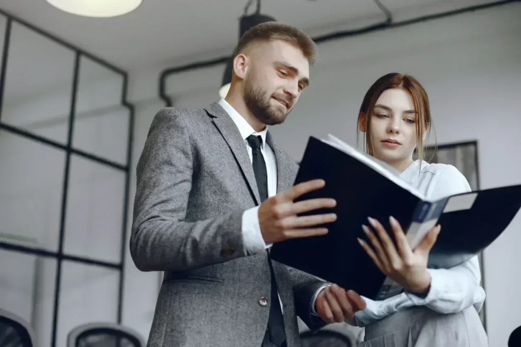 Lawyer showing divorce papers to client