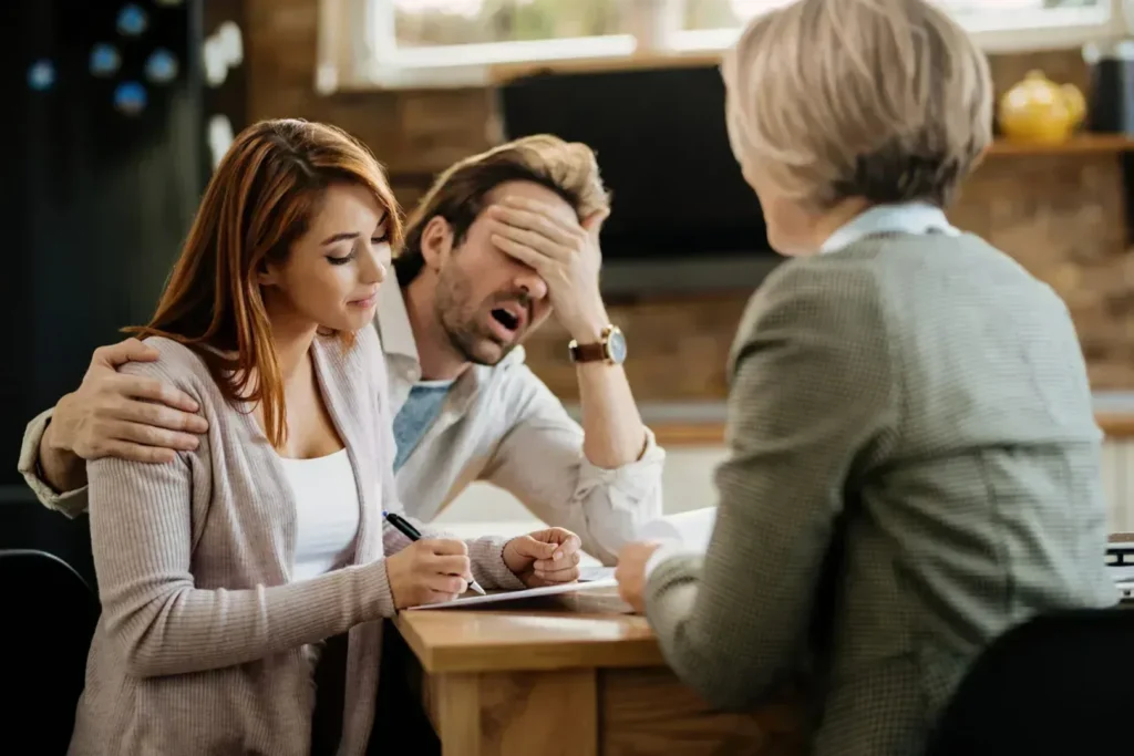 Woman signing divorce papers