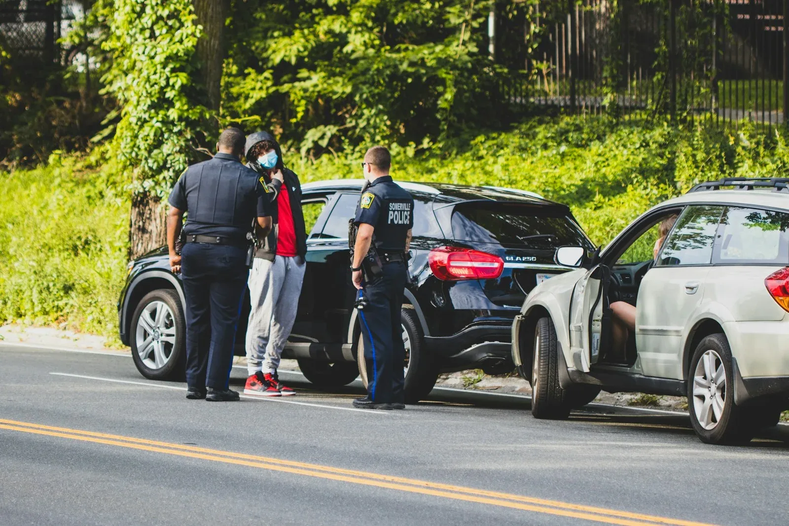 Police officers at the scene of a traffic accident